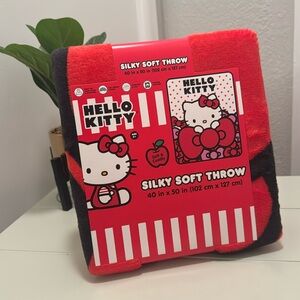 New Hello Kitty silky 40x50 inch throw. Red and pink. Super soft and cozy